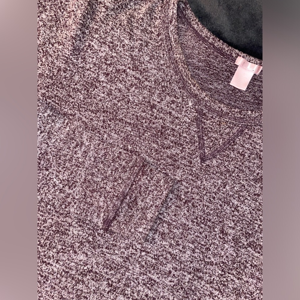 Woman’s long sleeve, brand is ‘True’, size small.